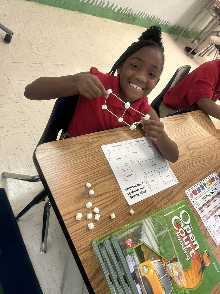 Mrs. Harper's class learning about 2D and 3D shapes 