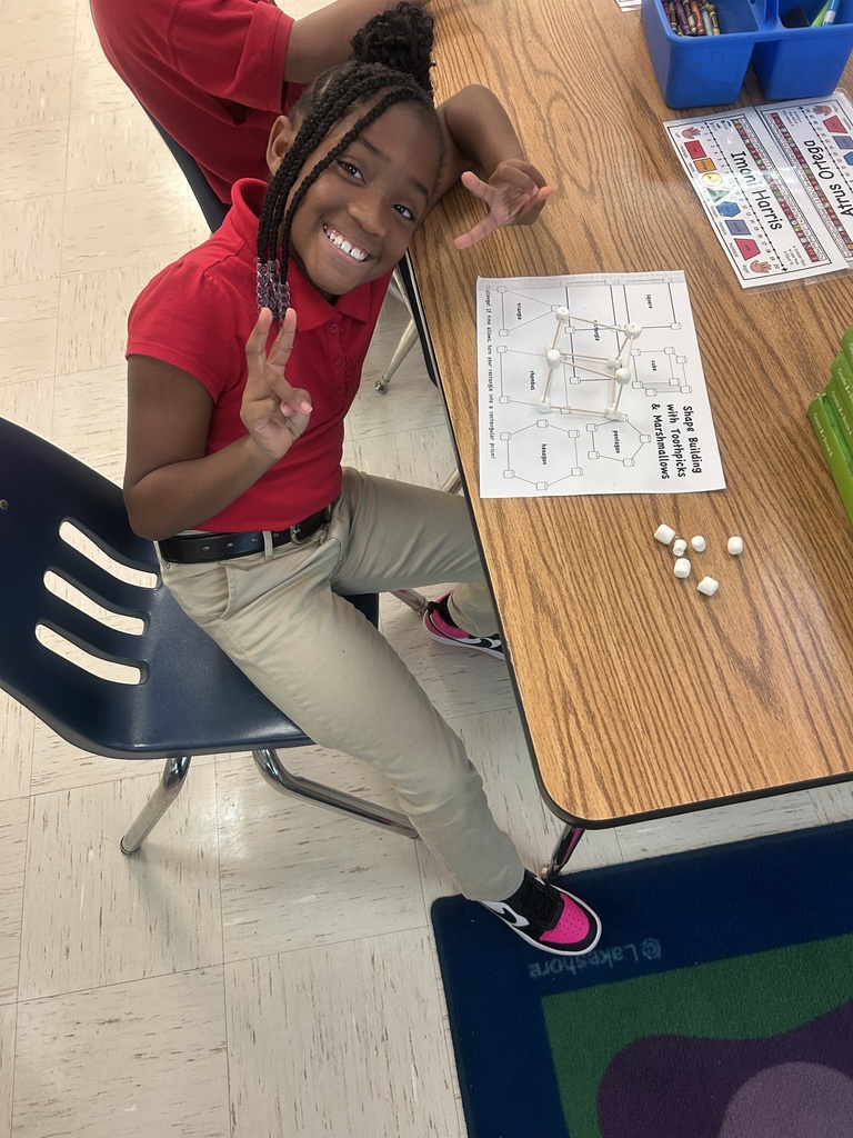 Mrs. Harper's class learning about 2D and 3D shapes 