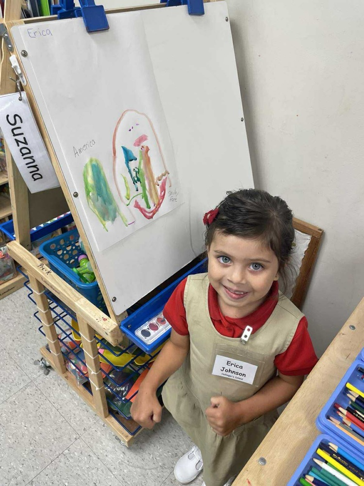 Pre K student working/playing in a center