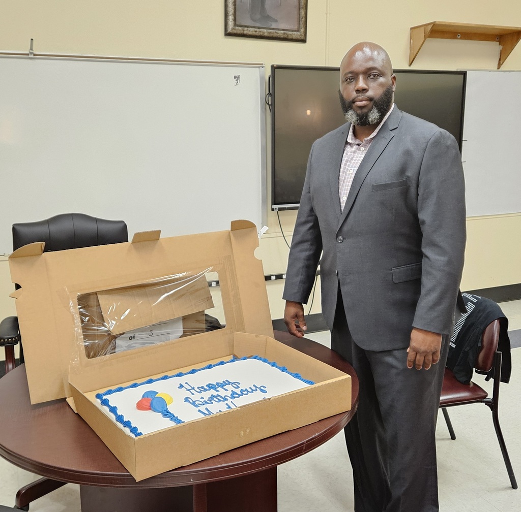 photo of Mr. Harris with his birthday cake