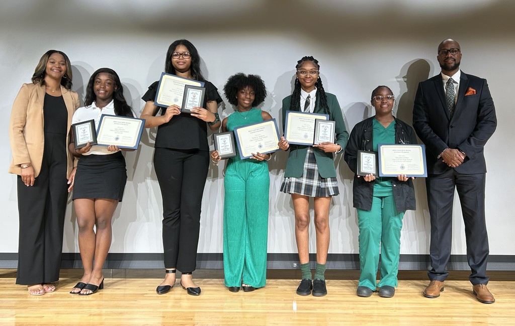 From left are LeFlore Assistant Principal Cassandra Kellum, AP Scholars Ja’nya Wooten, Jamiyah Robbins, Taylor Andrews, Joss Wicks, and MaLajha Gordon,  and Dr. Antonio Williams, Principal.
