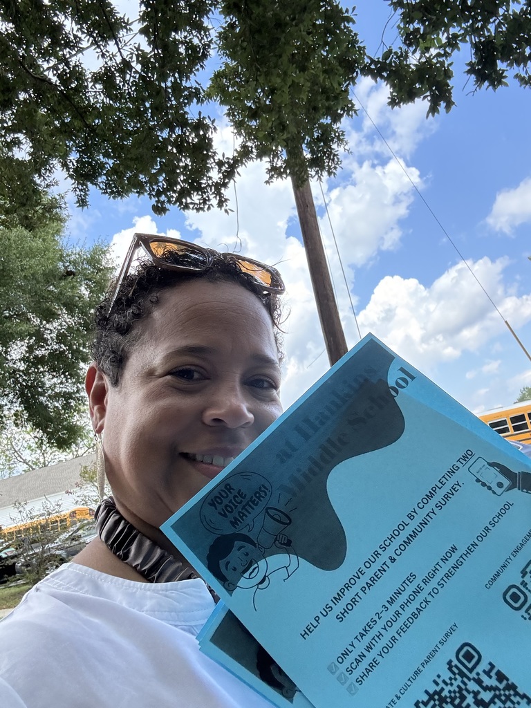 A lady holding a survey
