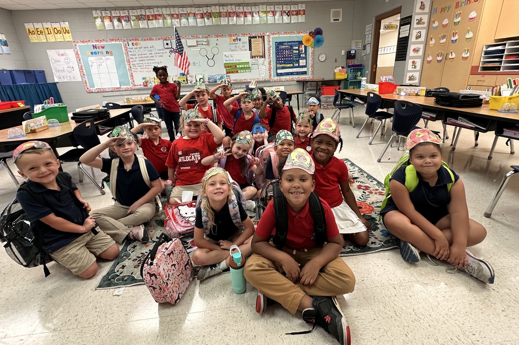 Classroom picture of students celebrating heroes.