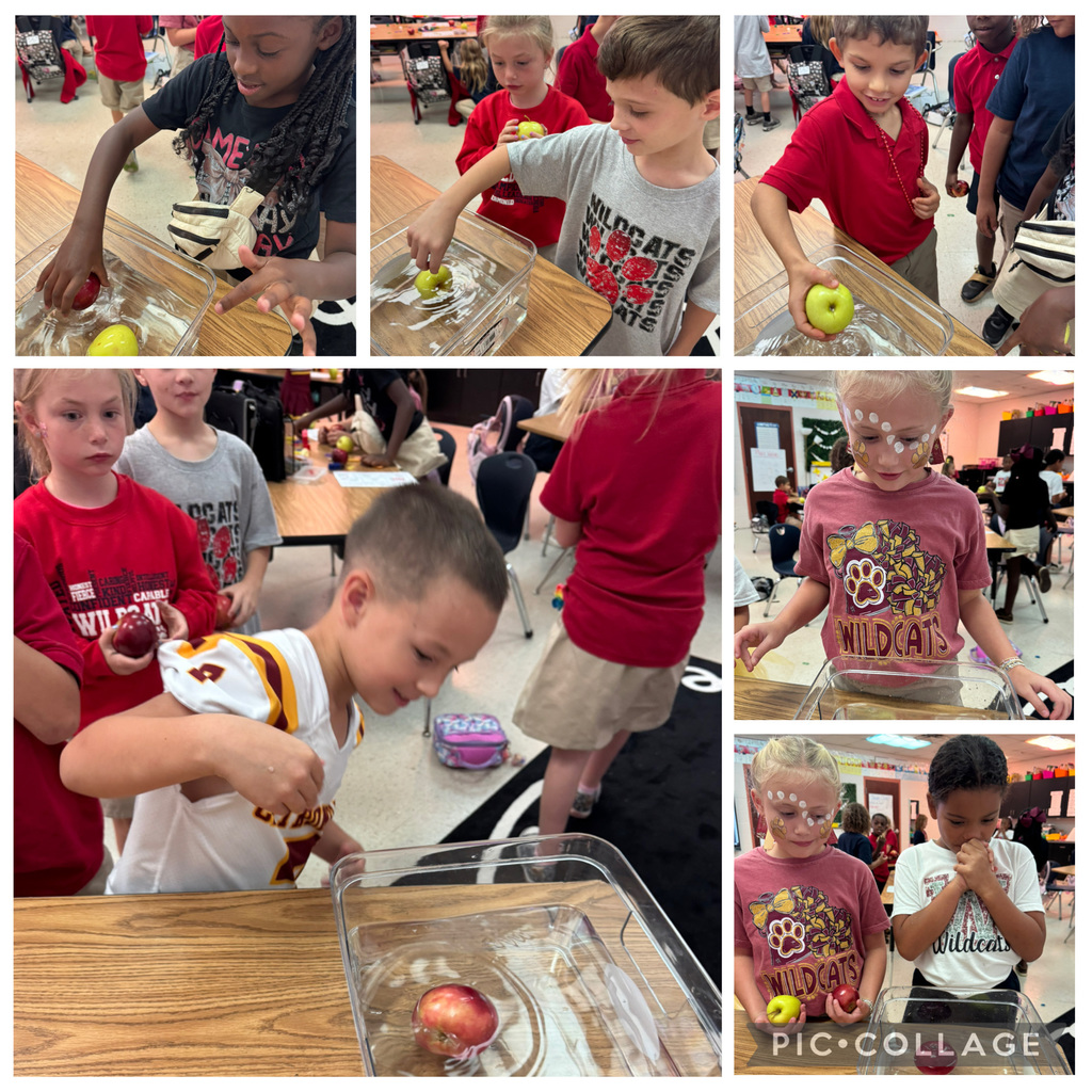 Students eating apples.