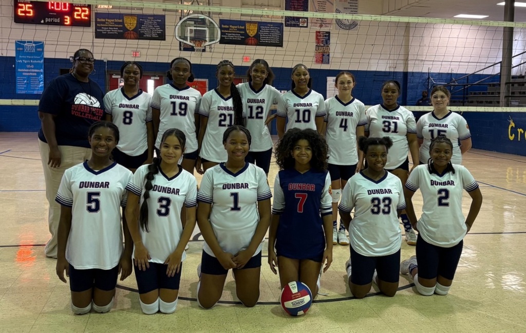 Picture of Lady Tigers Volleyball team after playoff win.
