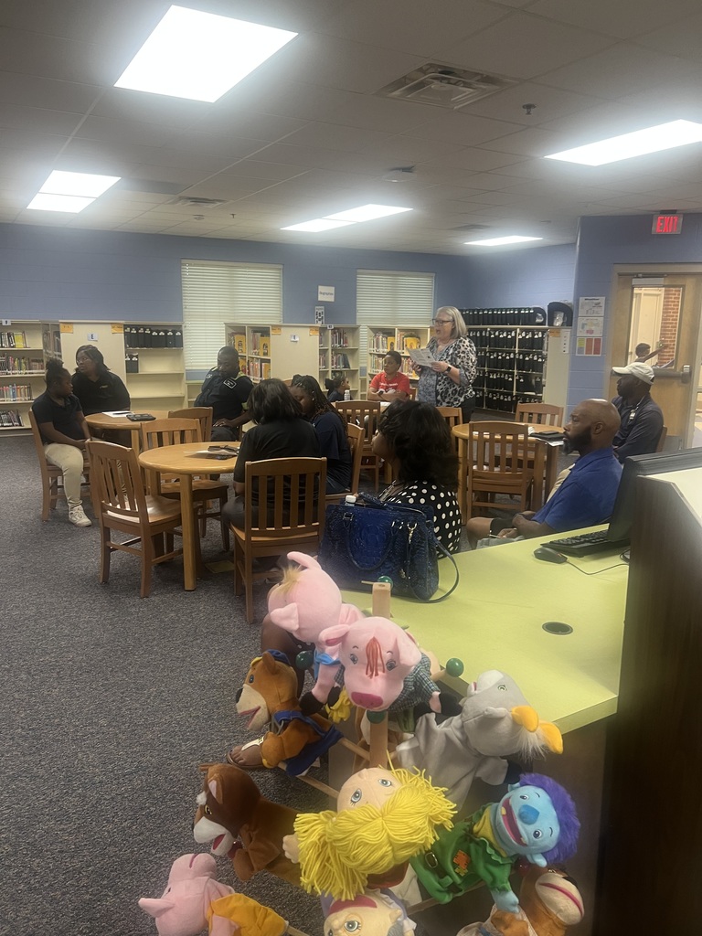 Parents sitting in title I meeting 