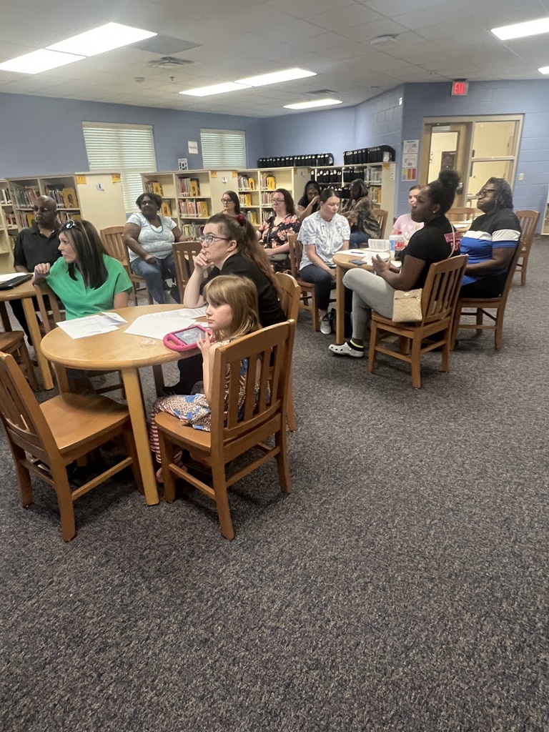 Parents sitting in Title I meeting 