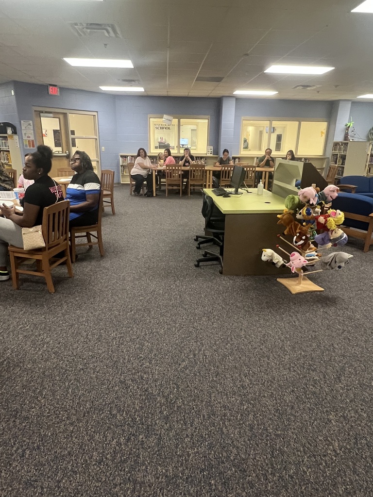 Parents sitting in Title I meeting