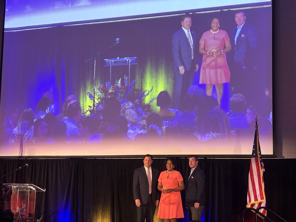 Dr. Monica Motley accepts the Community Partner of the Year award for MCPSS. 