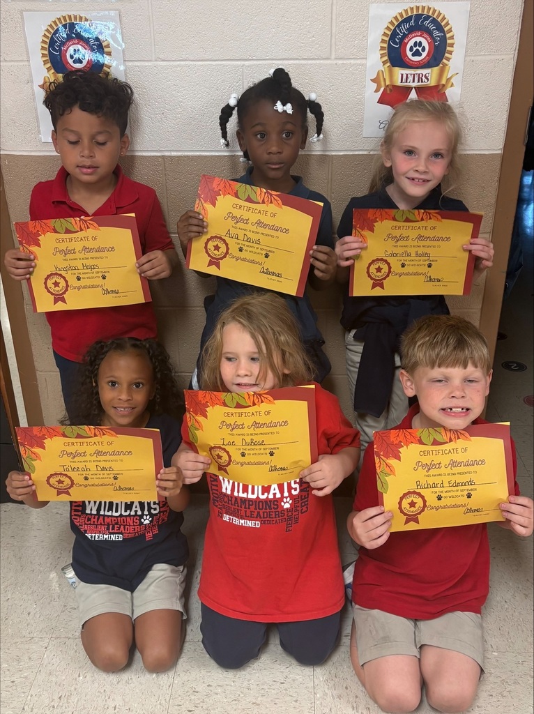 Students holding award