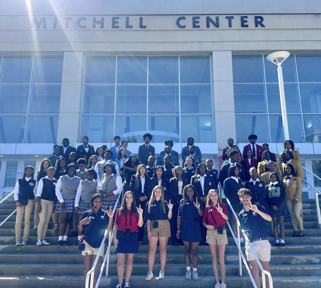 A large group of students on the steps of the Mitchell Center