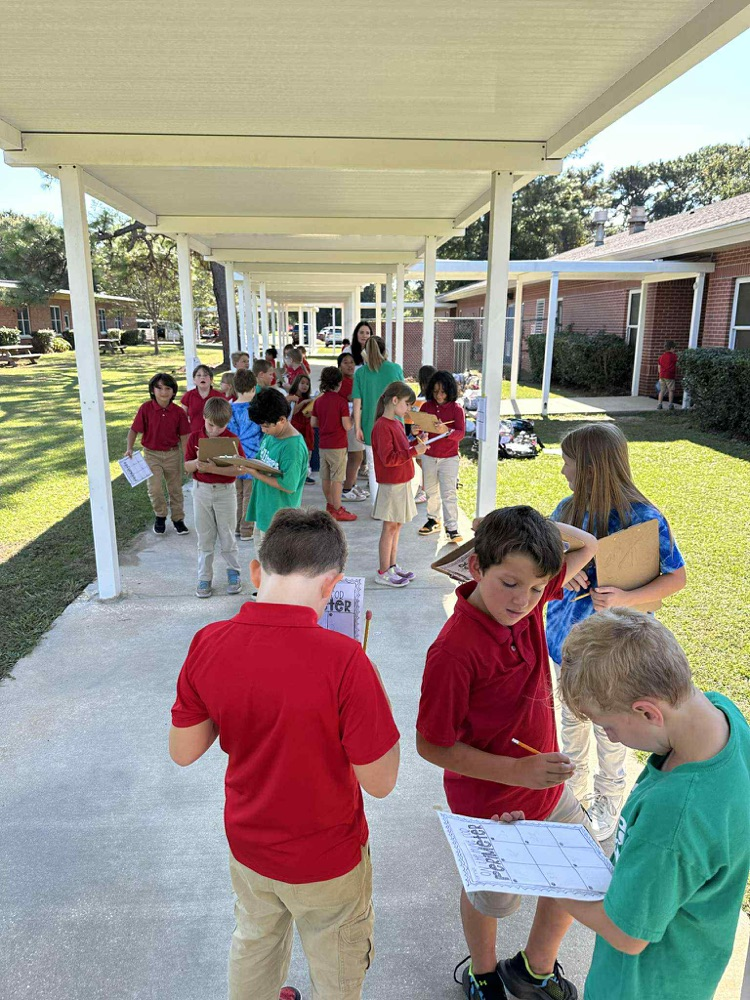 students doing math problems outside