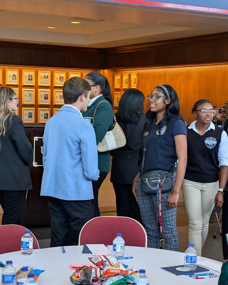 MGM Academy Ambassador speaking with an Ambassador from another school.