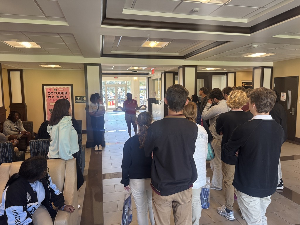 MGM seniors listening to a presentation