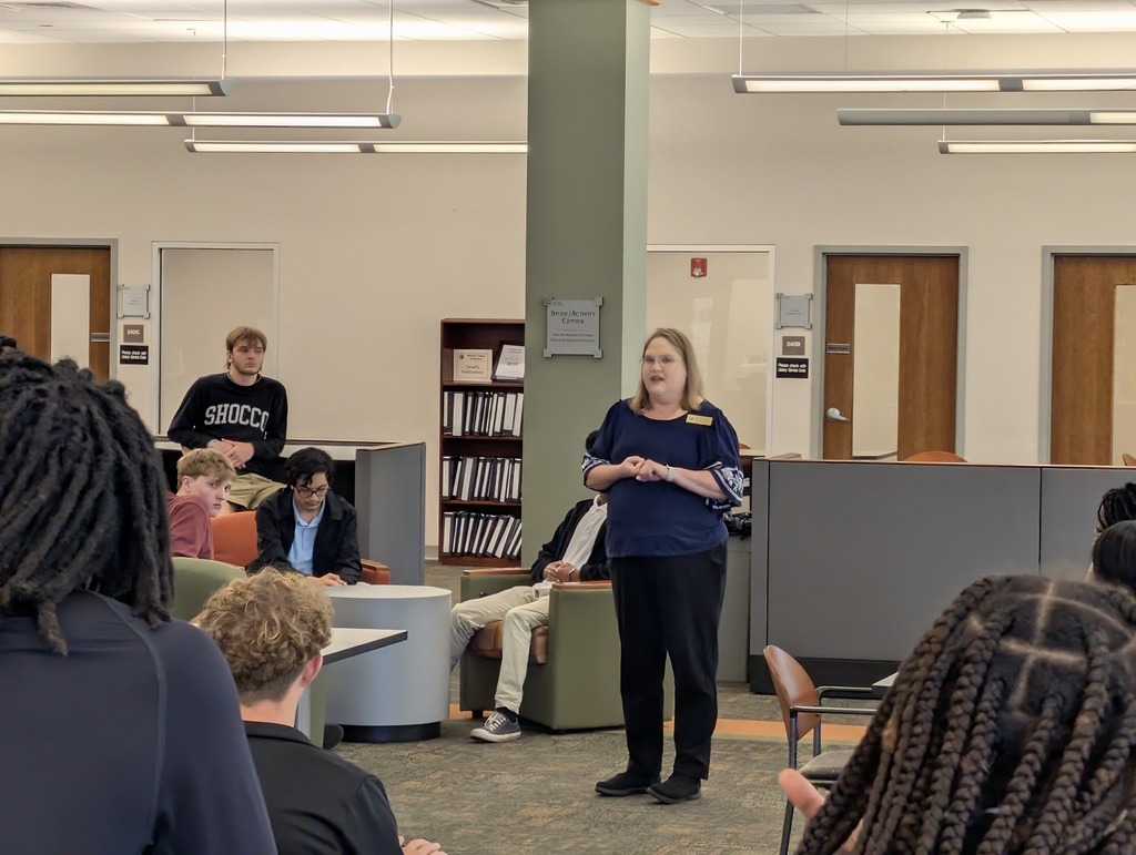MGM seniors listening to a presentation