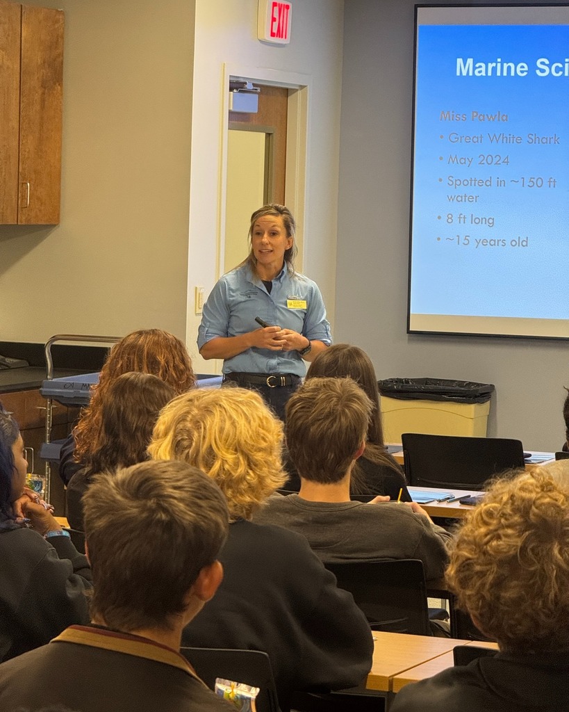 MGM seniors listening to a presentation
