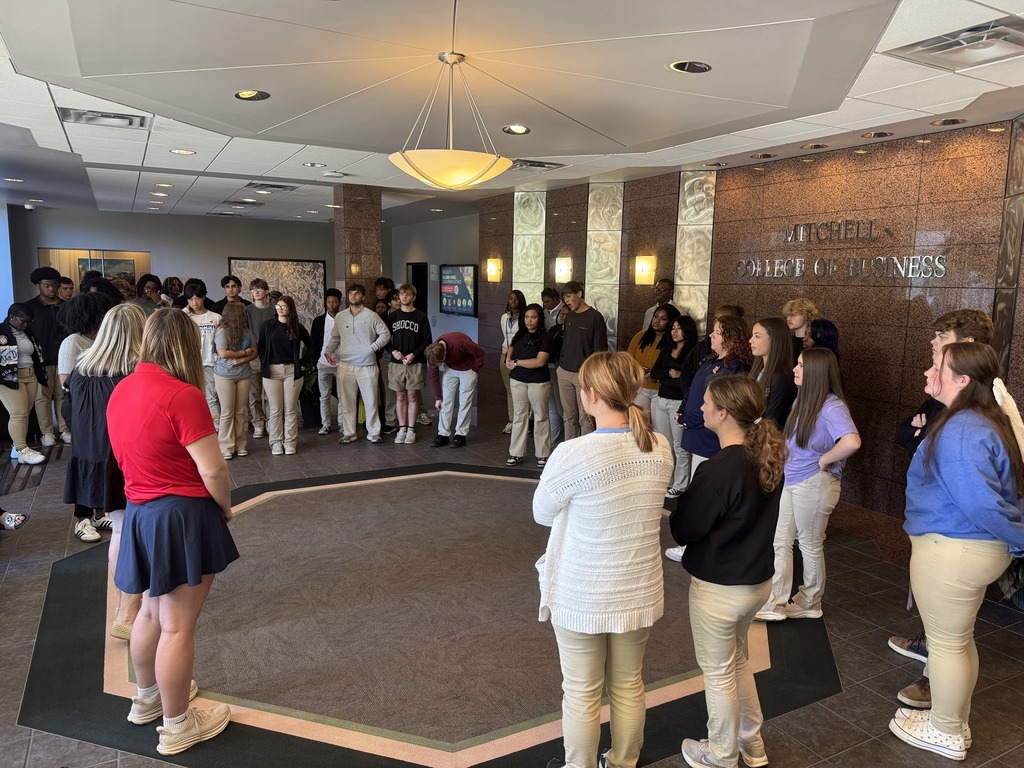 MGM seniors listening to a presentation