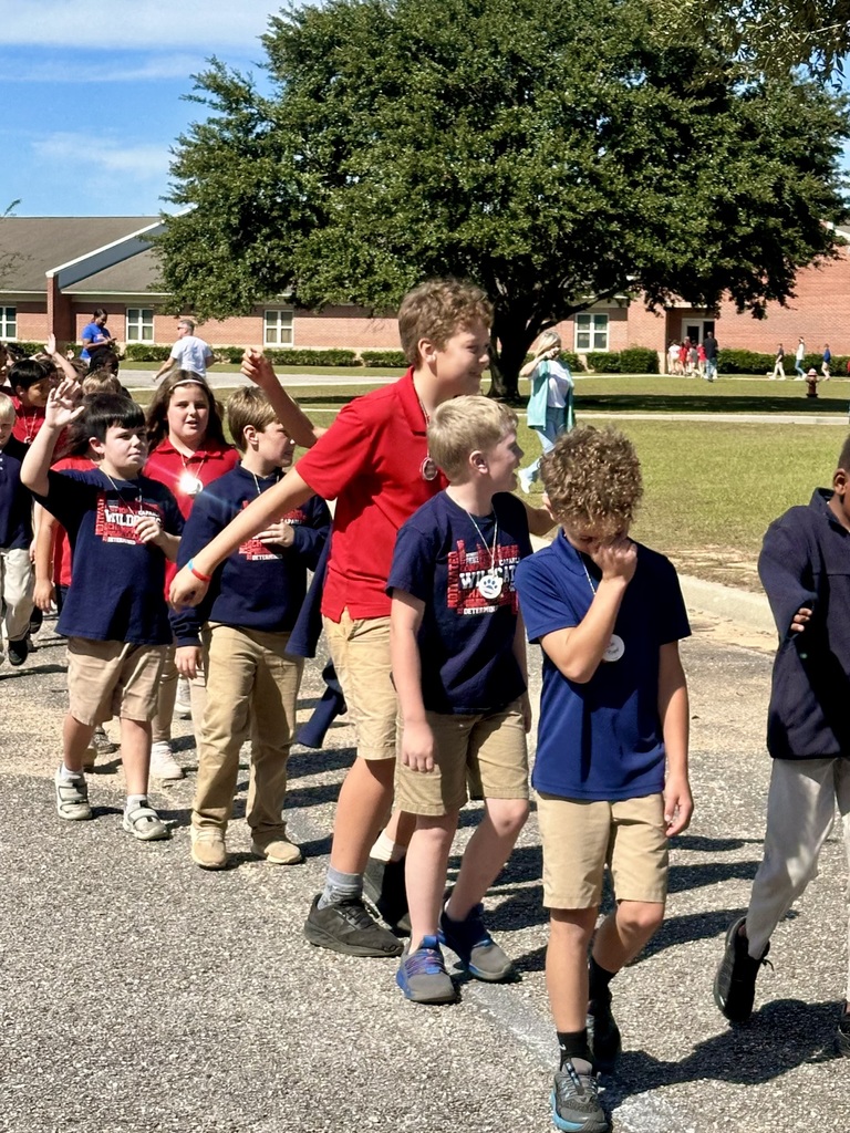 students marching in parade
