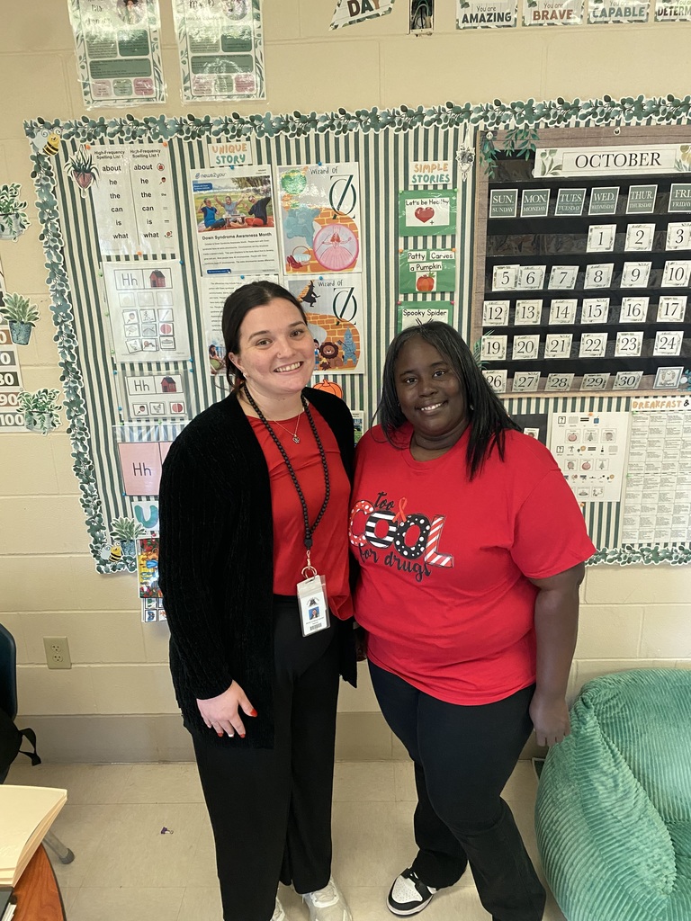 Teacher and para in Red