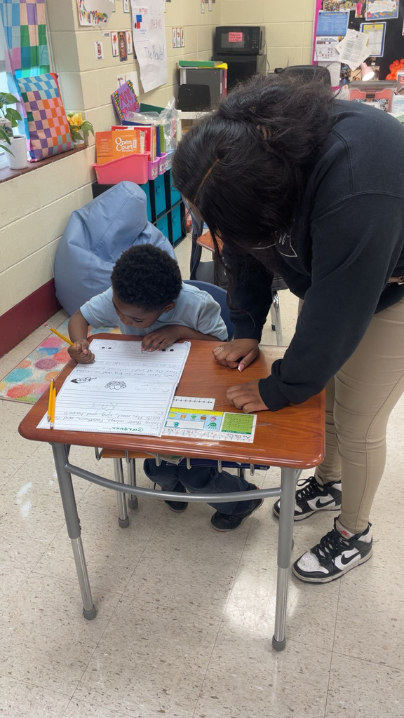 Faulkner student volunteering at Ella Grant Elementary.