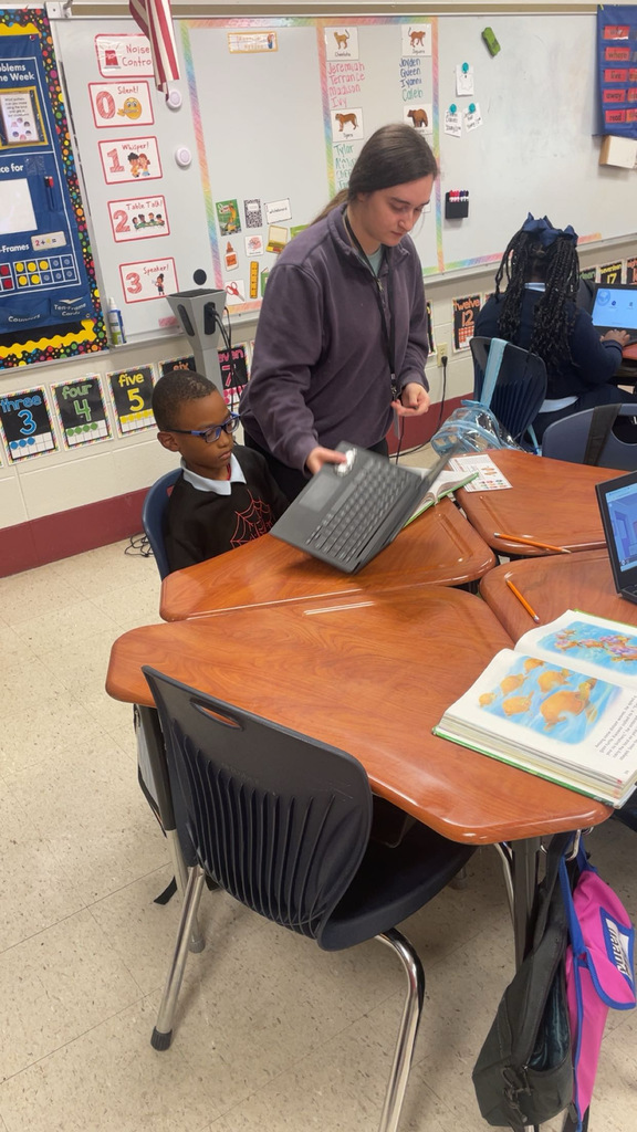 Faulkner student volunteering at Ella Grant Elementary.
