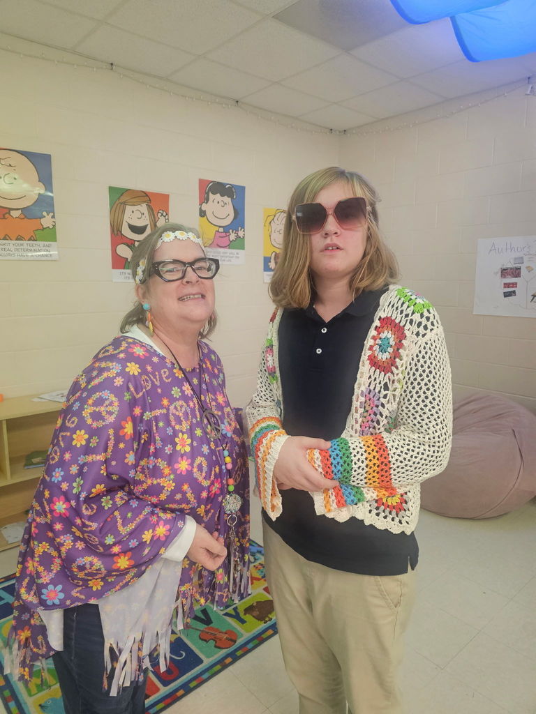 Teacher with student in 70s 