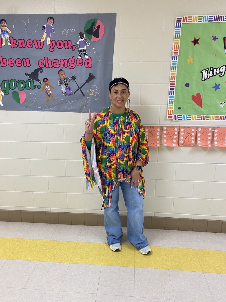 Mrs. Kidd in 70s attire 