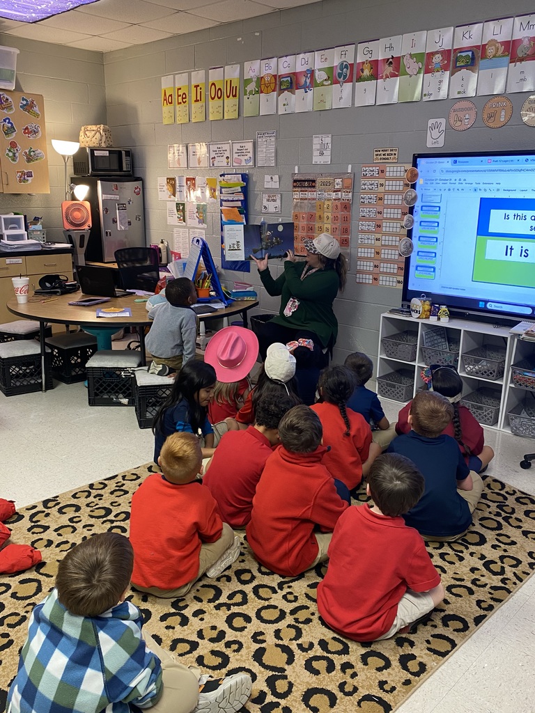 teacher reading a book
