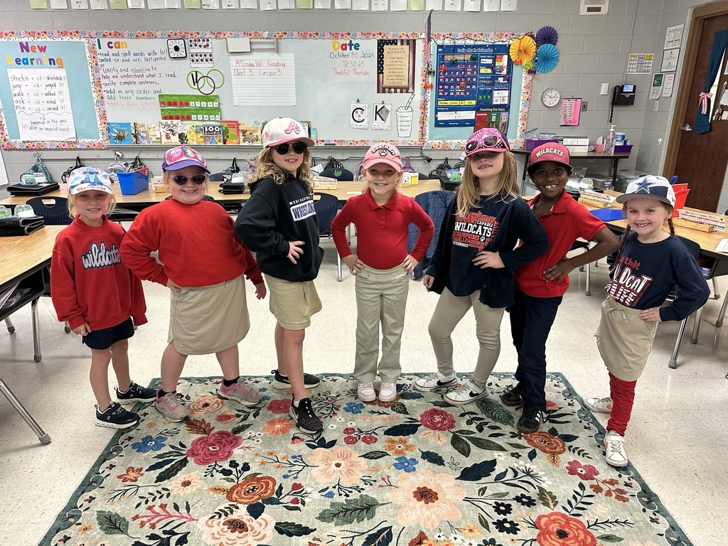 students wearing caps and glasses