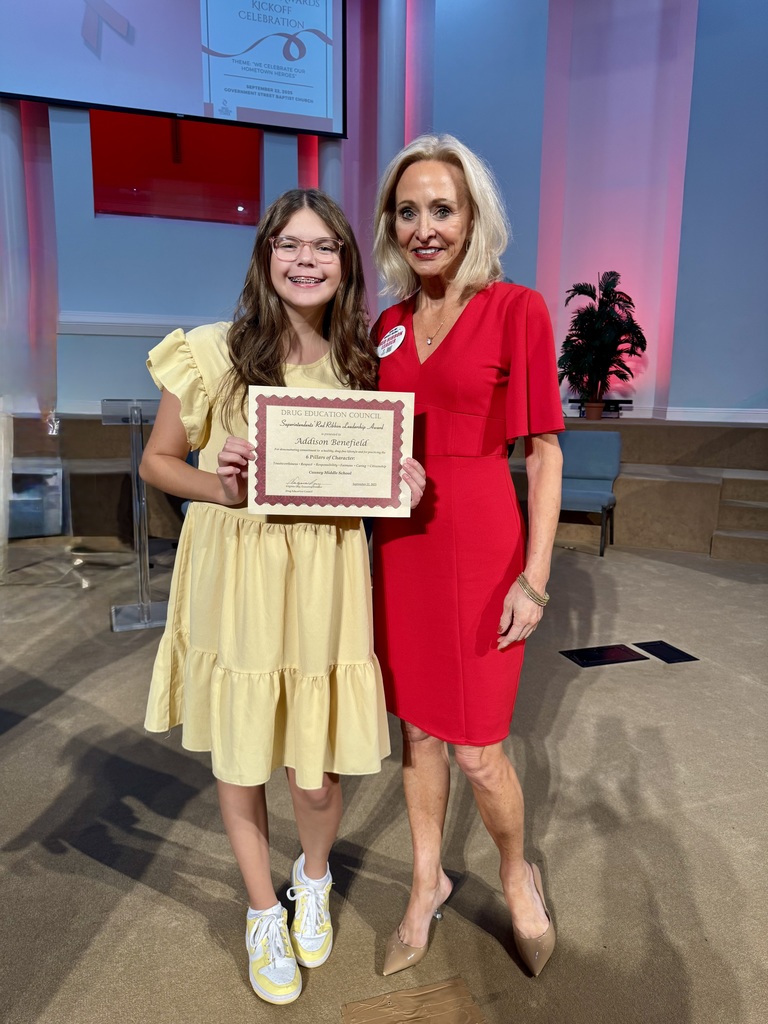 Addison Benefield and woman in red dress.
