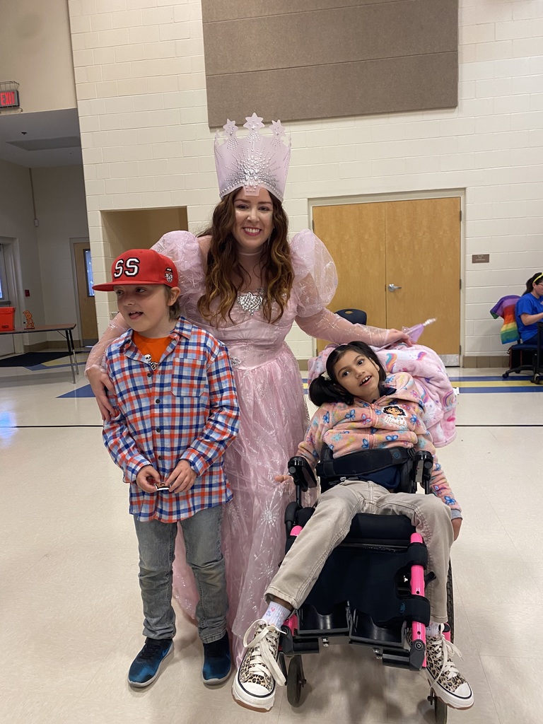 Mrs. Elliott with student 