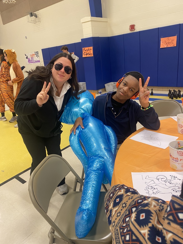 Rise student with PE teacher 