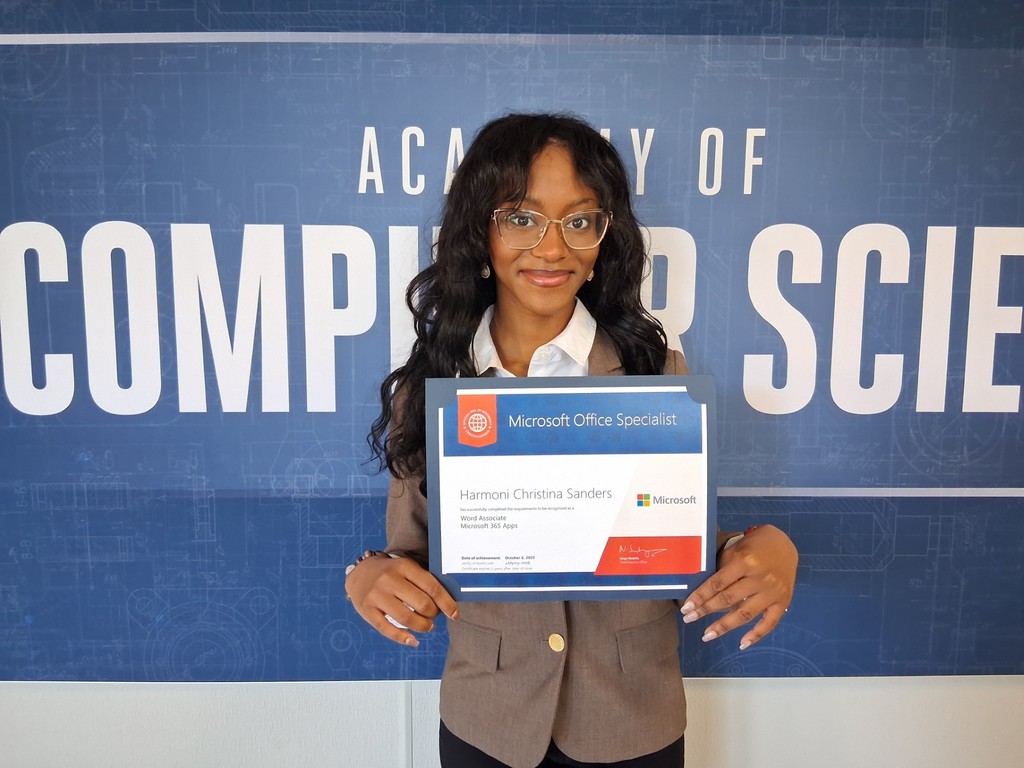 Hamoni with her certificate