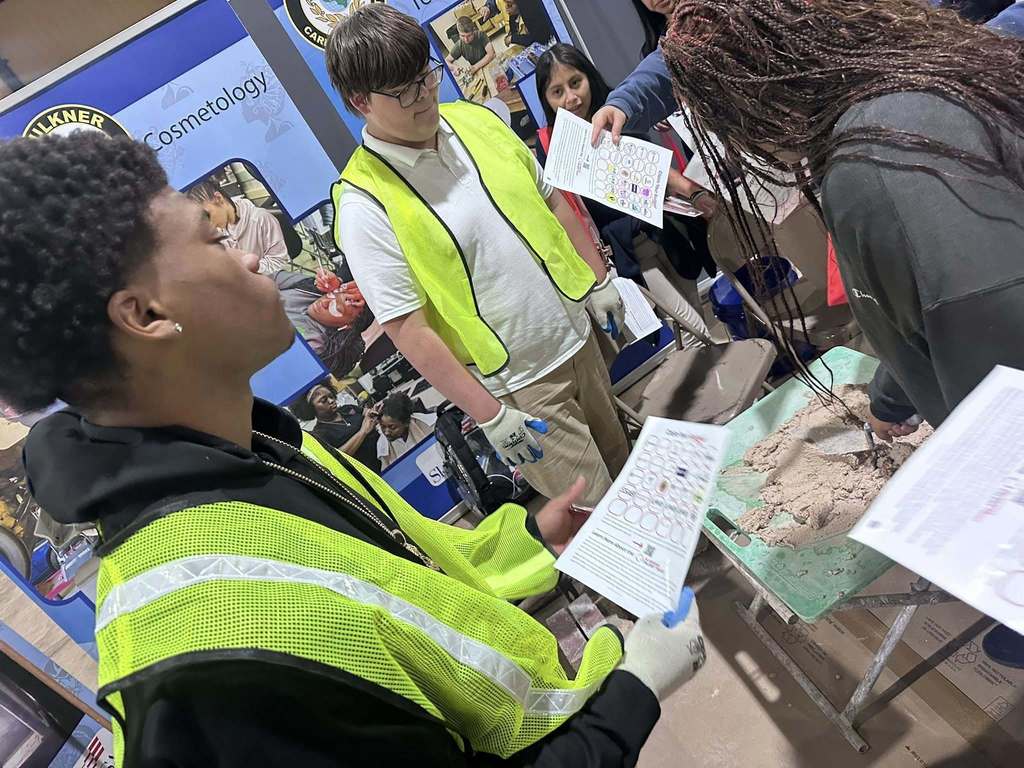 Masonry Students instructing middle school students