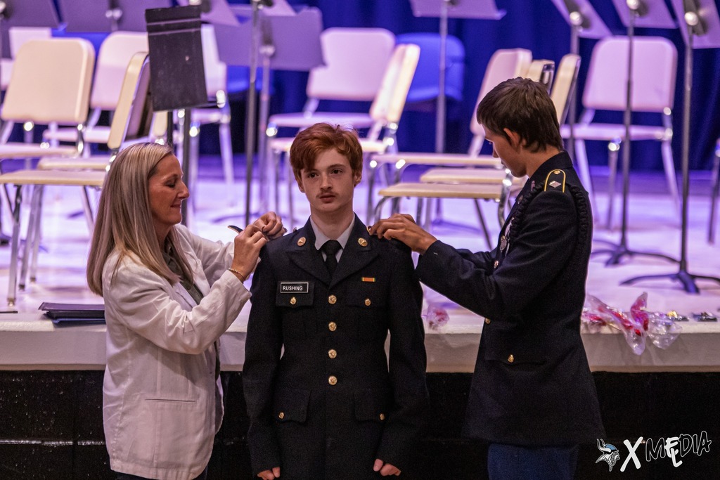 Cadets received their new cords and pins with the help of Assistant Principal, Ms. Box.