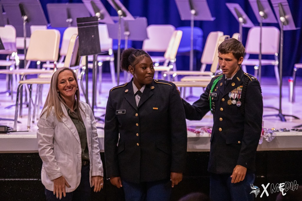 Cadets received their new cords and pins with the help of Assistant Principal, Ms. Box.