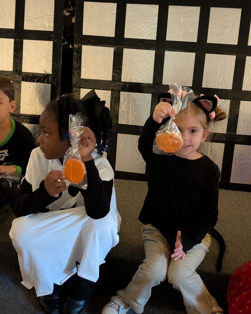 Pre-K students with cookies