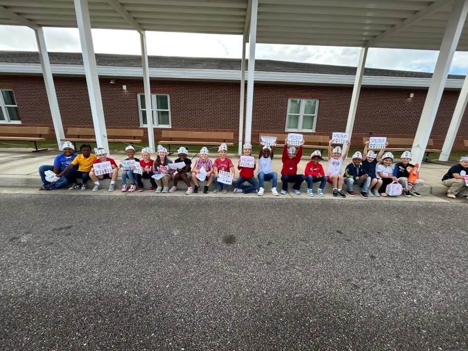 Taylor-White students with signs
