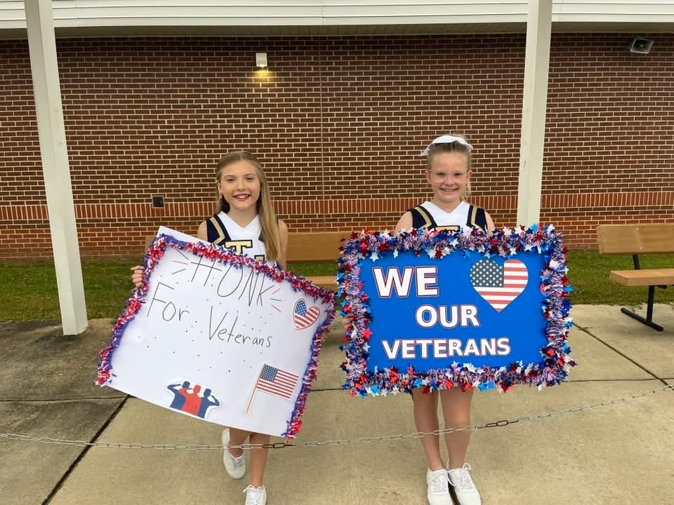 Taylor-White students with signs