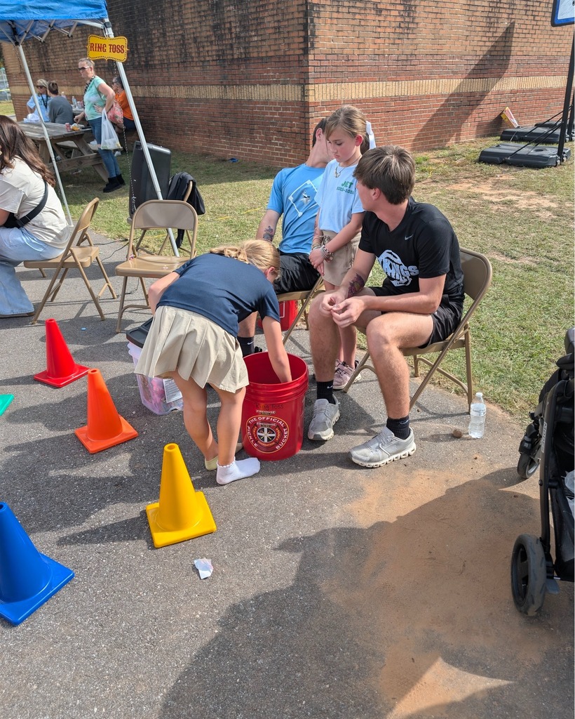 Students volunteering at Fall Festivals