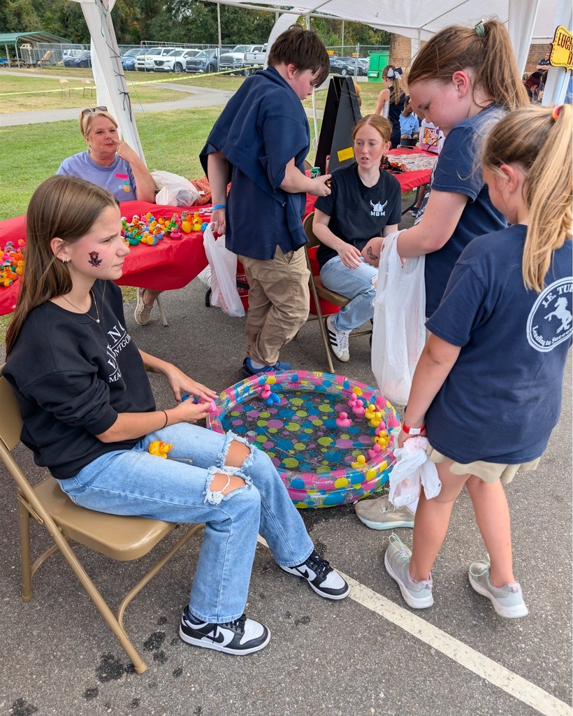 Students volunteering at Fall Festivals