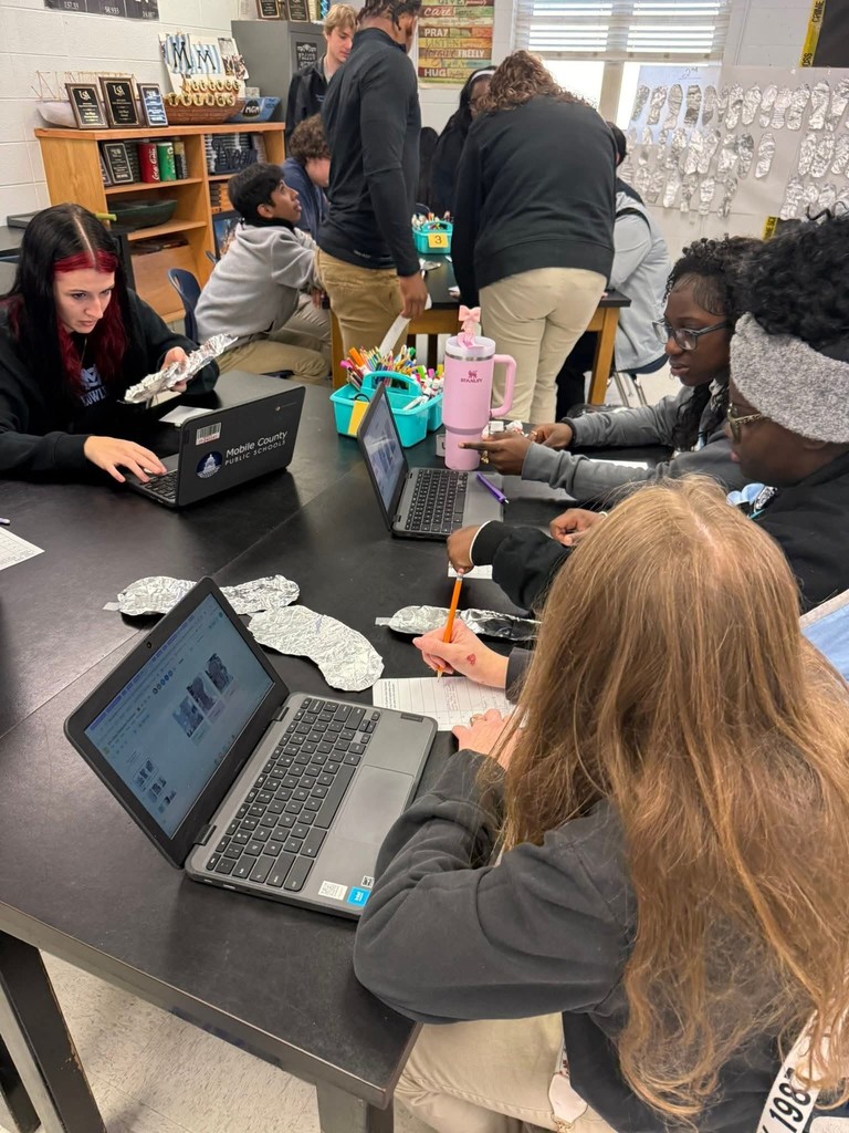 Students analyzing impressions from other classes