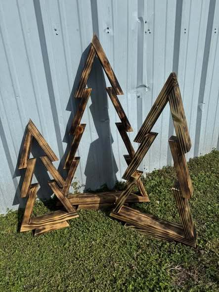 Wooden cut-outs of Christmas trees