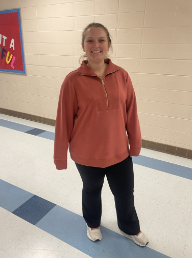 Teacher standing in the hallway