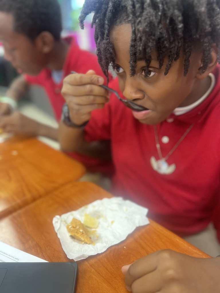 Ms. Colston's Class discussing a Thanksgiving passage and eating pumpkin pie. 