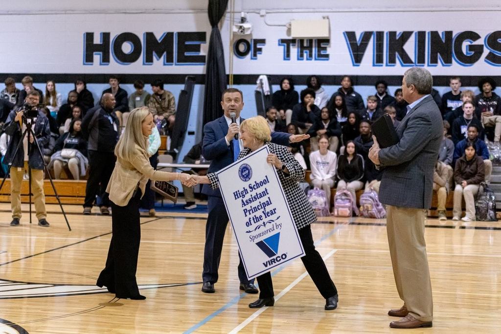 Mrs. Box receiving her award