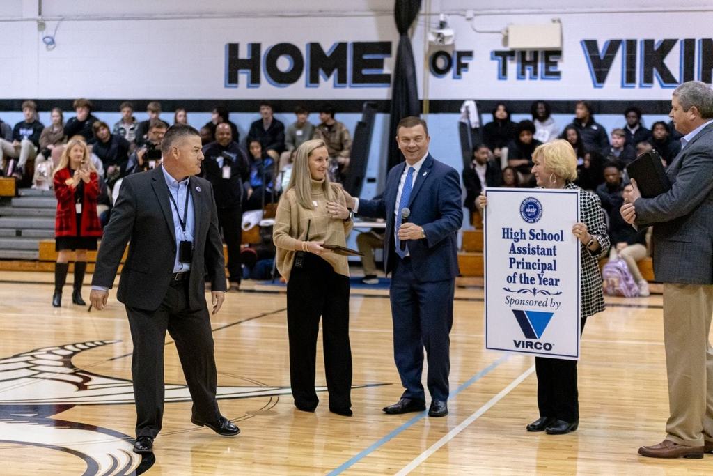 Mrs. Box receiving her award