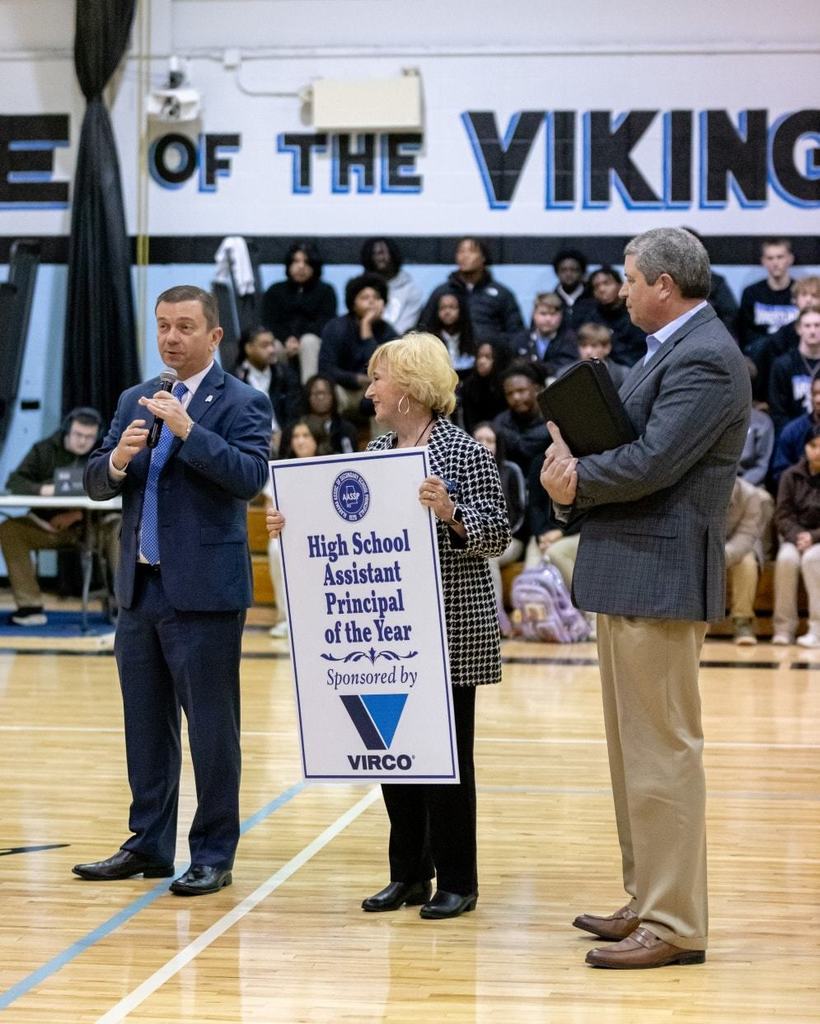 The award being presented to Mrs. Box