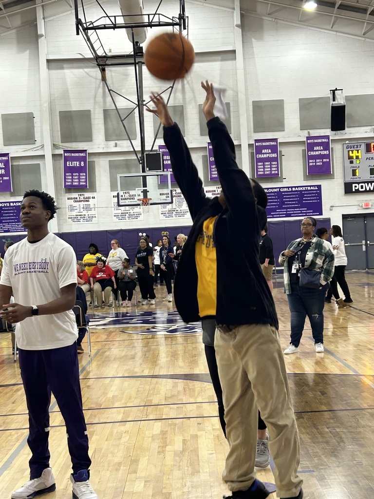 Student shooting basket photo 2 