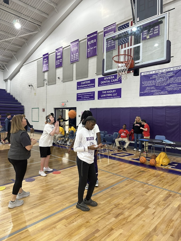 Student shooting a basketball